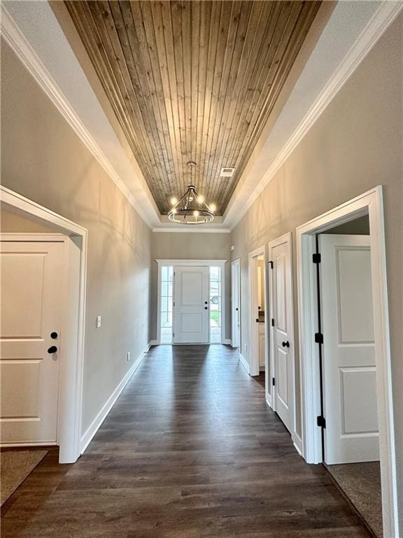 11805 E Ridgeview Ct, Peculiar, MO 64078 - foyer featuring a chandelier, dark wood-style flooring, wood ceiling, ornamental molding, and vaulted ceiling