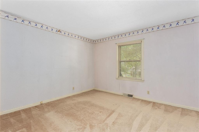 13220 W 76th St, Lenexa, KS 66216 - empty room featuring carpet and baseboards