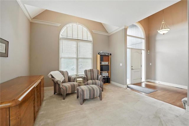 5708 Cottonwood St, Shawnee, KS 66216 - sitting room featuring lofted ceiling, light colored carpet, and crown molding