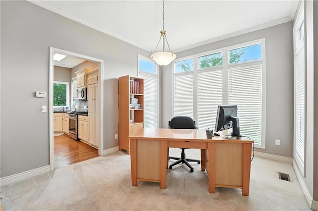 5708 Cottonwood St, Shawnee, KS 66216 - home office with ornamental molding, light colored carpet, and plenty of natural light