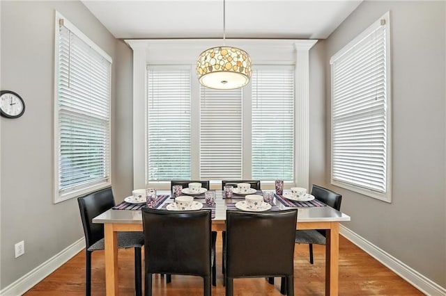 5708 Cottonwood St, Shawnee, KS 66216 - dining space with plenty of natural light and wood finished floors