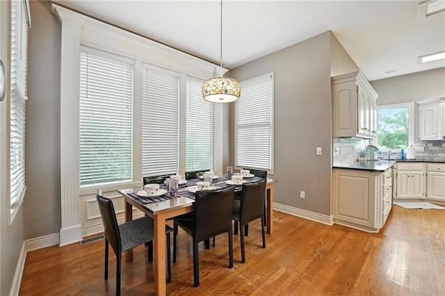 5708 Cottonwood St, Shawnee, KS 66216 - dining space featuring light wood finished floors and baseboards