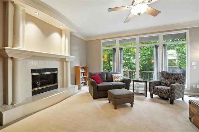 5708 Cottonwood St, Shawnee, KS 66216 - carpeted living room with a premium fireplace, ornamental molding, plenty of natural light, and a ceiling fan