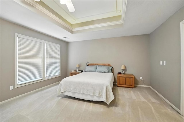 5708 Cottonwood St, Shawnee, KS 66216 - carpeted bedroom featuring a raised ceiling, ornamental molding, and a ceiling fan