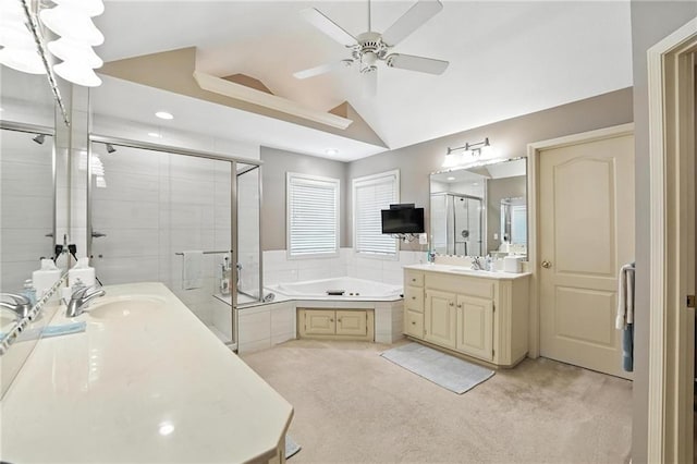 5708 Cottonwood St, Shawnee, KS 66216 - bathroom featuring two vanities, a stall shower, lofted ceiling, a bath, and ceiling fan