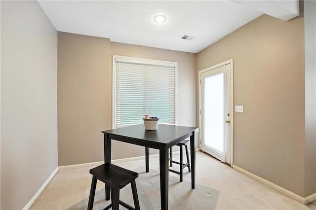 5708 Cottonwood St, Shawnee, KS 66216 - dining space with baseboards and light colored carpet