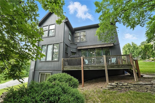 5708 Cottonwood St, Shawnee, KS 66216 - back of house featuring a wooden deck