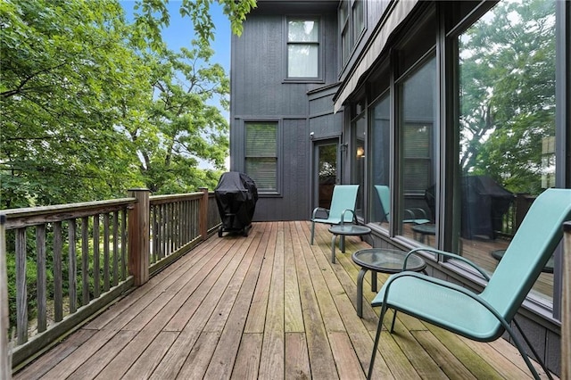 5708 Cottonwood St, Shawnee, KS 66216 - wooden terrace with a grill