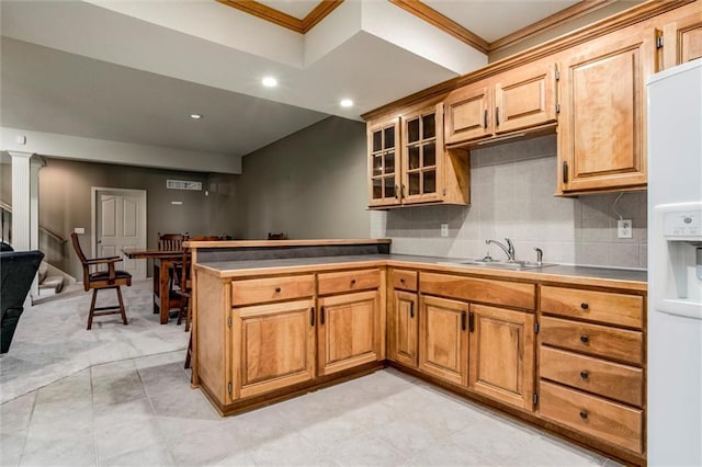 19326 W 98th St, Lenexa, KS 66220 - kitchen featuring white fridge with ice dispenser, a peninsula, glass insert cabinets, tasteful backsplash, and recessed lighting