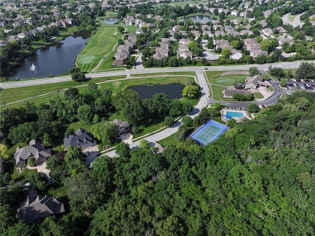 19326 W 98th St, Lenexa, KS 66220 - aerial view of property and surrounding area with a large body of water and nearby suburban area