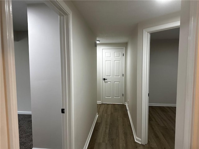 1411 NE 85th Ter, Kansas City, MO 64155 - hall with dark wood finished floors and baseboards
