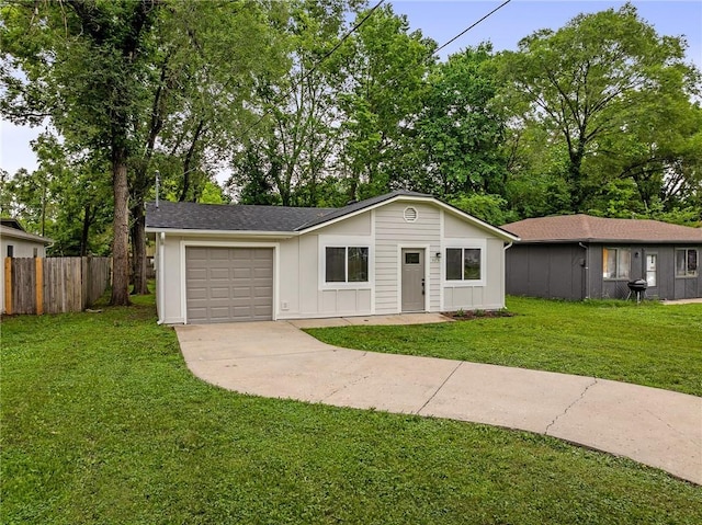 508 N Lincoln St, Olathe, KS 66061 - ranch-style home featuring concrete driveway, a garage, and board and batten siding