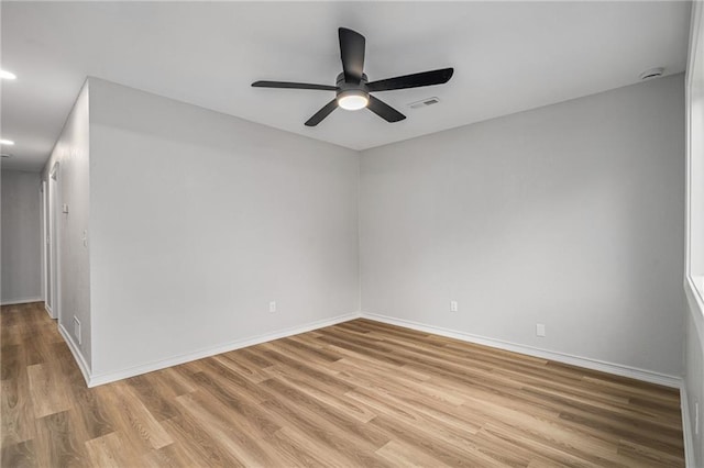 508 N Lincoln St, Olathe, KS 66061 - unfurnished room featuring light wood finished floors, ceiling fan, and recessed lighting