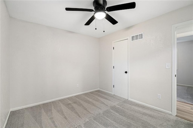 508 N Lincoln St, Olathe, KS 66061 - unfurnished bedroom with carpet, ceiling fan, and a closet