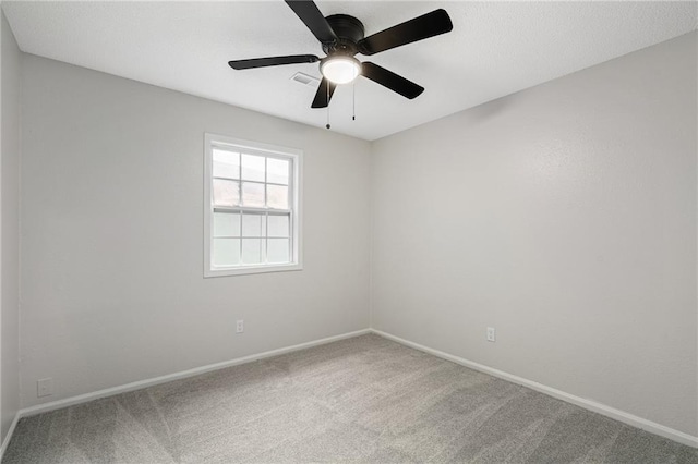 508 N Lincoln St, Olathe, KS 66061 - carpeted empty room featuring baseboards and ceiling fan