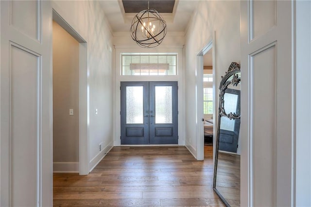 12605 W 169th St, Overland Park, KS 66221 - entrance foyer featuring wood-type flooring, french doors, and a chandelier