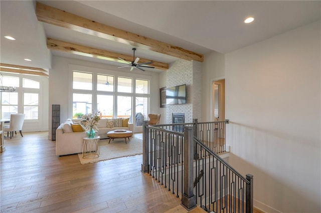 12605 W 169th St, Overland Park, KS 66221 - hall with beamed ceiling, recessed lighting, wood-type flooring, and an upstairs landing