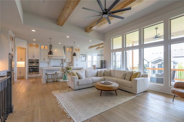 12605 W 169th St, Overland Park, KS 66221 - living area with a ceiling fan, beamed ceiling, light wood-style flooring, and recessed lighting