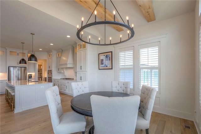 12605 W 169th St, Overland Park, KS 66221 - dining room featuring a chandelier, light wood finished floors, beamed ceiling, and recessed lighting
