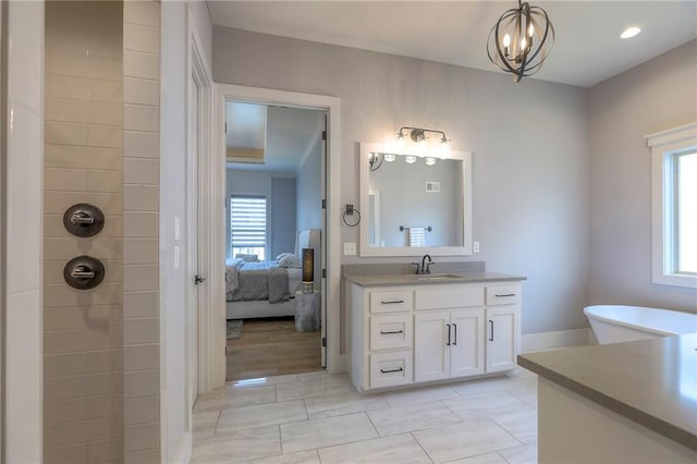 12605 W 169th St, Overland Park, KS 66221 - ensuite bathroom with vanity, tiled shower, and a chandelier