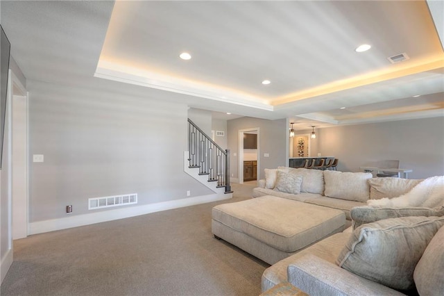 12605 W 169th St, Overland Park, KS 66221 - living area featuring a raised ceiling, stairway, carpet floors, and recessed lighting