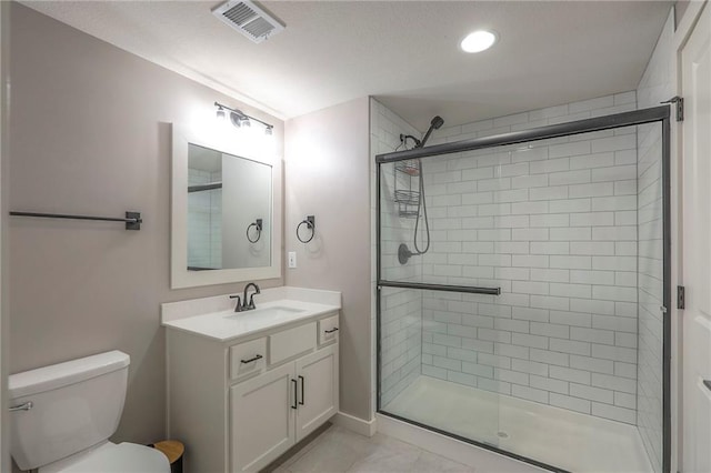 12605 W 169th St, Overland Park, KS 66221 - bathroom with a shower stall, vanity, and recessed lighting