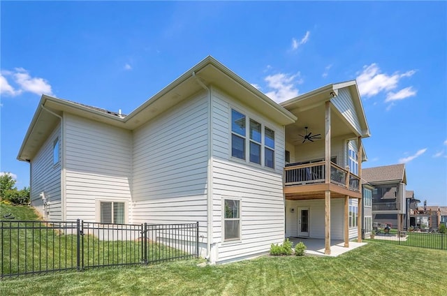 12605 W 169th St, Overland Park, KS 66221 - rear view of house featuring ceiling fan, a balcony, a patio, and a fenced backyard