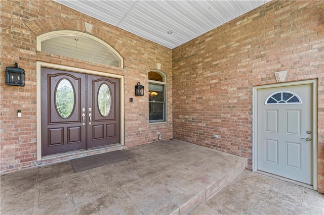 31134 W 161st St, Excelsior Springs, MO 64024 - property entrance with brick siding and a porch