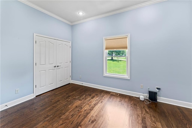 31134 W 161st St, Excelsior Springs, MO 64024 - unfurnished bedroom featuring crown molding, dark wood-style flooring, a closet, and recessed lighting