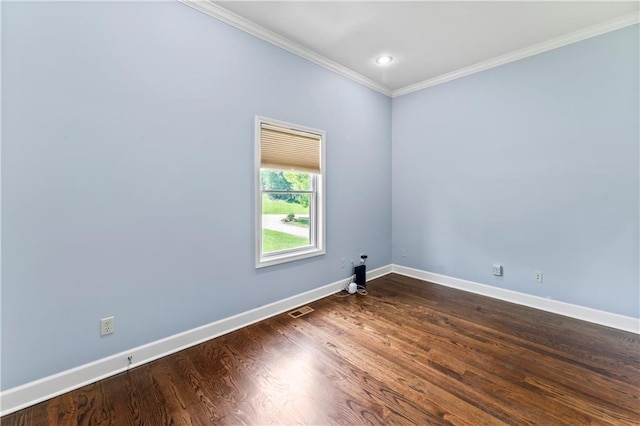 31134 W 161st St, Excelsior Springs, MO 64024 - spare room featuring ornamental molding, dark wood-style flooring, and recessed lighting