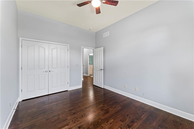 31134 W 161st St, Excelsior Springs, MO 64024 - unfurnished bedroom with dark wood-type flooring, a closet, and a ceiling fan