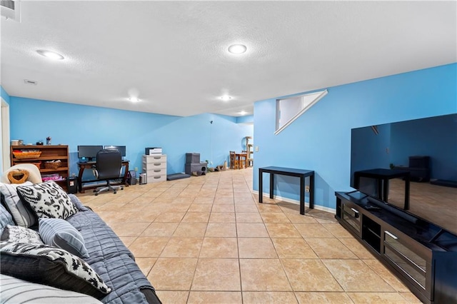 31134 W 161st St, Excelsior Springs, MO 64024 - living area with a textured ceiling, light tile patterned floors, a desk, and recessed lighting