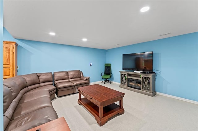 31134 W 161st St, Excelsior Springs, MO 64024 - living room with recessed lighting, carpet floors, and a glass covered fireplace