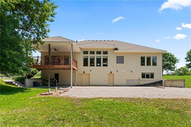 31134 W 161st St, Excelsior Springs, MO 64024 - back of property with ceiling fan, a lawn, a patio, and a deck