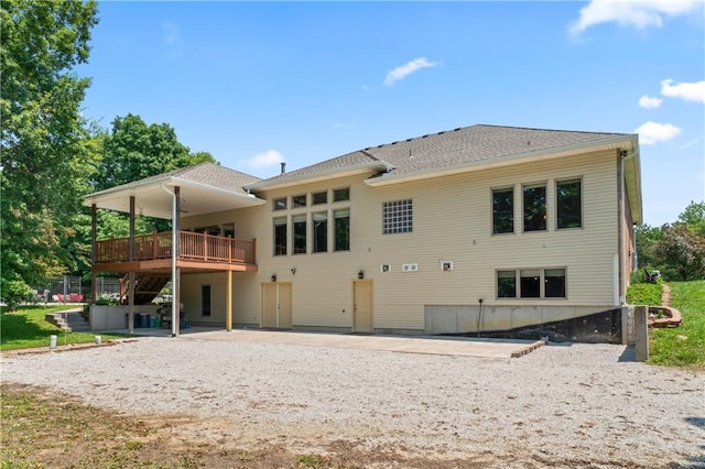 31134 W 161st St, Excelsior Springs, MO 64024 - back of property with a patio and a wooden deck