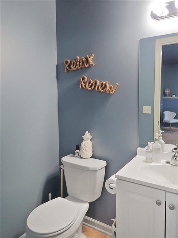 4301 NE 84th Ter, Kansas City, MO 64156 - bathroom featuring toilet and vanity