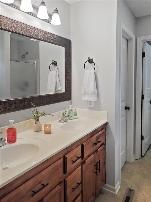 4301 NE 84th Ter, Kansas City, MO 64156 - full bathroom with double vanity and an enclosed shower