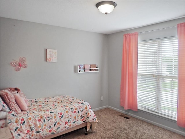 4301 NE 84th Ter, Kansas City, MO 64156 - bedroom with carpet and baseboards