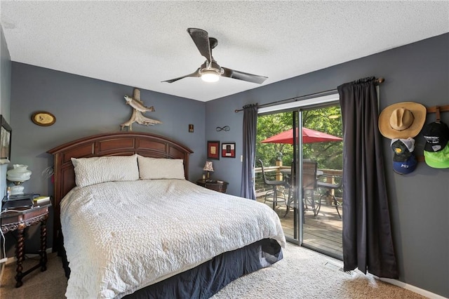 321 W Sugarlake Dr, Mound City, KS 66056 - bedroom with carpet flooring, access to outside, a textured ceiling, and ceiling fan