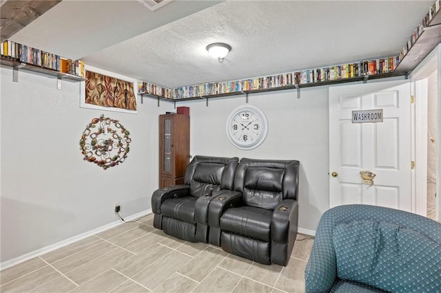 321 W Sugarlake Dr, Mound City, KS 66056 - living area with baseboards and a textured ceiling