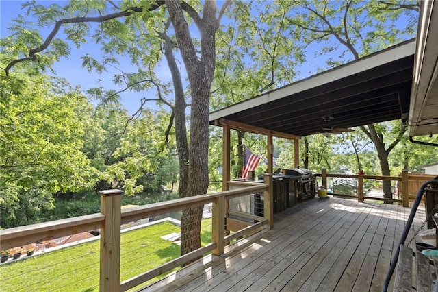 321 W Sugarlake Dr, Mound City, KS 66056 - wooden terrace featuring a yard
