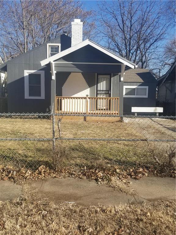 7403 Montgall Ave, Kansas City, MO 64132 - view of front of house featuring a chimney