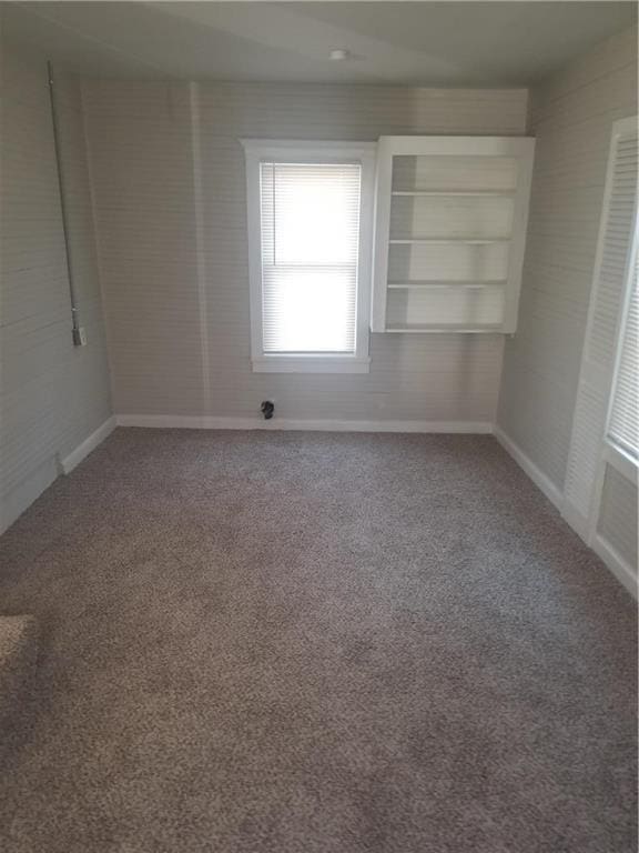 7403 Montgall Ave, Kansas City, MO 64132 - empty room with carpet flooring and baseboards