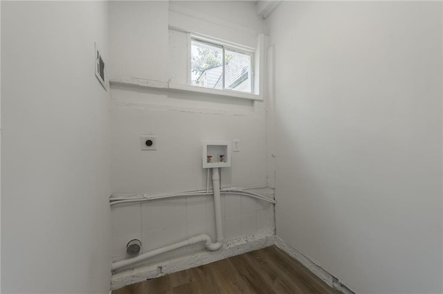 8801 E 49th St, Kansas City, MO 64129 - laundry room featuring washer hookup, dark wood-type flooring, and electric dryer hookup