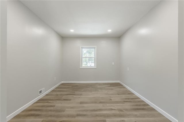 8801 E 49th St, Kansas City, MO 64129 - empty room featuring recessed lighting and light wood finished floors