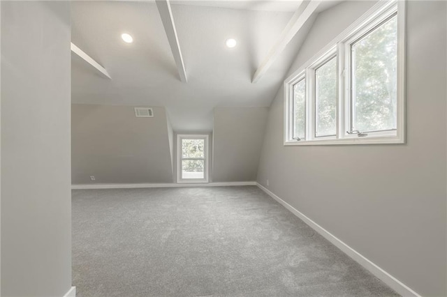 8801 E 49th St, Kansas City, MO 64129 - additional living space with lofted ceiling, carpet floors, and recessed lighting