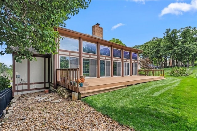 4328 W 110th St, Leawood, KS 66211 - rear view of property featuring a chimney and a wooden deck