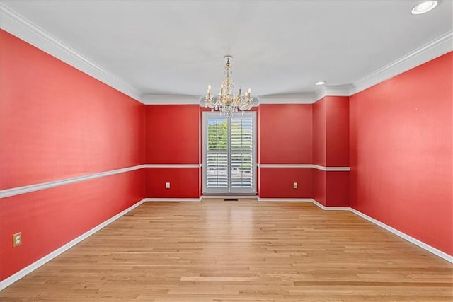 4328 W 110th St, Leawood, KS 66211 - unfurnished room with a chandelier, wood finished floors, ornamental molding, and recessed lighting