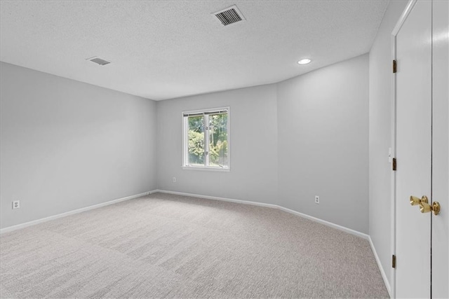 4328 W 110th St, Leawood, KS 66211 - carpeted empty room with a textured ceiling and recessed lighting