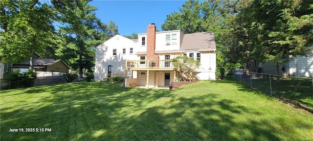8738 Horton St, Overland Park, KS 66207 - back of house with a fenced backyard, a chimney, a wooden deck, and stairs